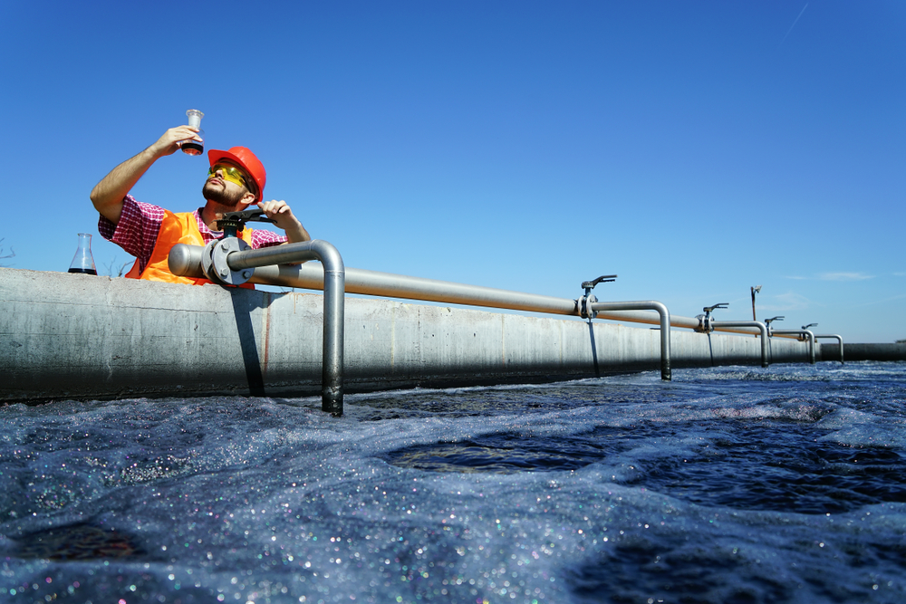 An,Engineer,Controlling,A,Quality,Of,Water,,aerated,Activated,Sludge