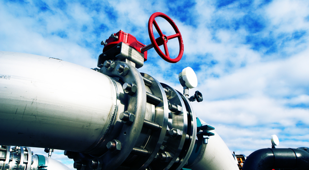 Industrial,Zone,,Steel,Pipelines,And,Valves,Against,Blue,Sky